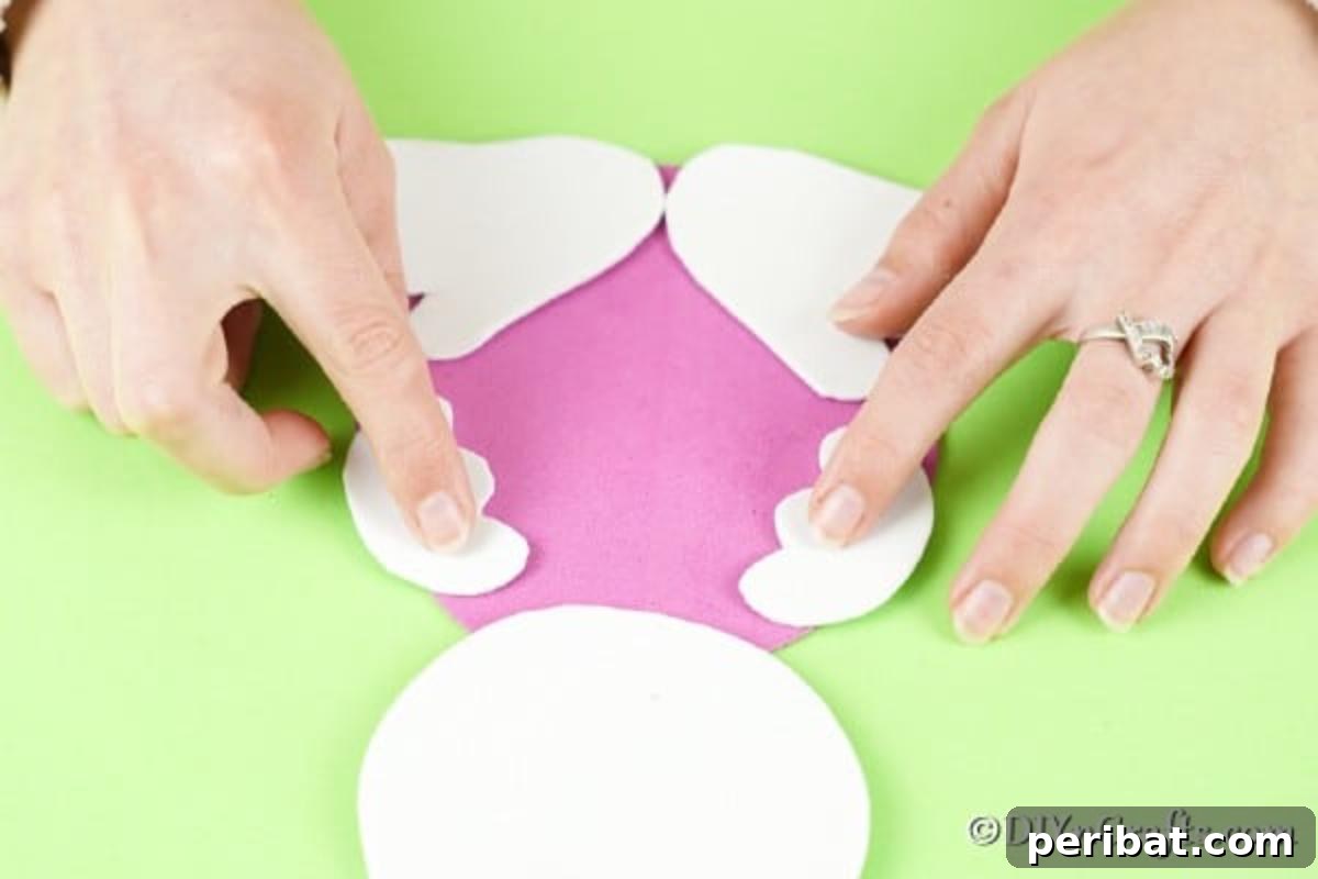 Crafting Charming Foam Easter Bunnies 12 Gluing the hands and feet onto the foam paper bunny body