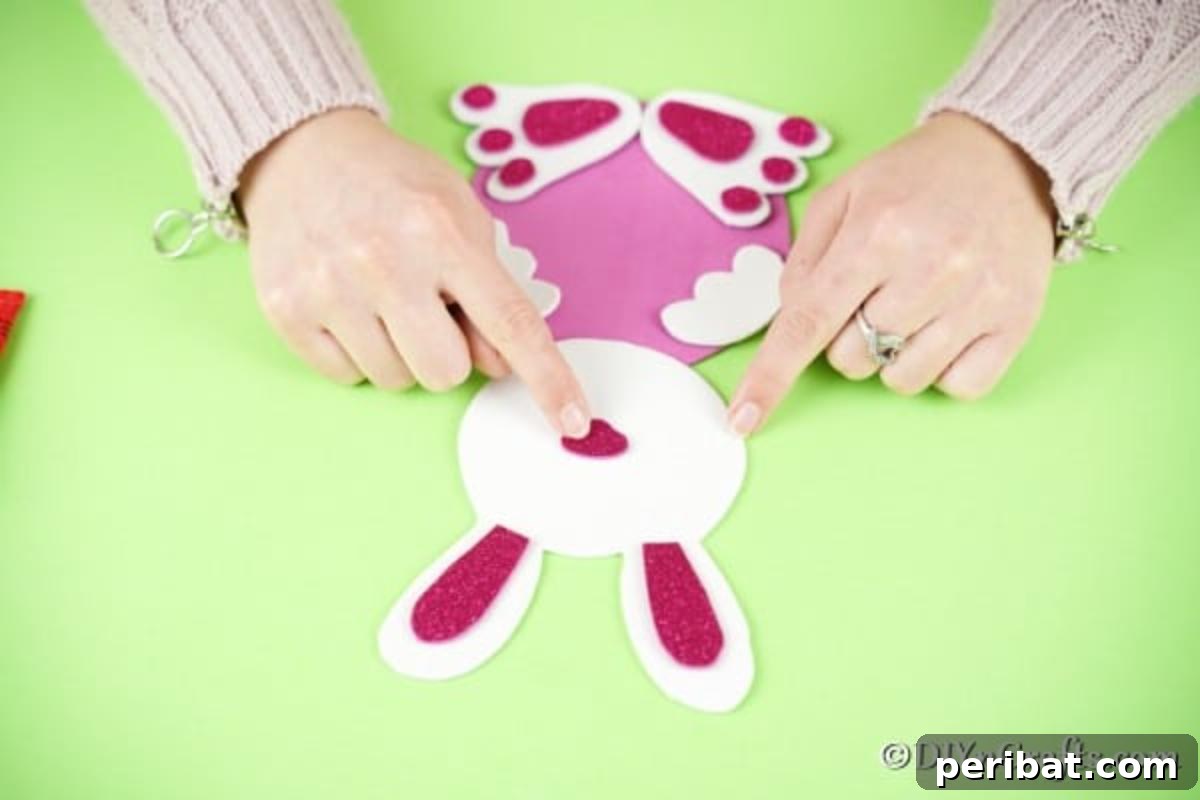 Crafting Charming Foam Easter Bunnies 13 Adding glitter accent pieces to the bunny's features