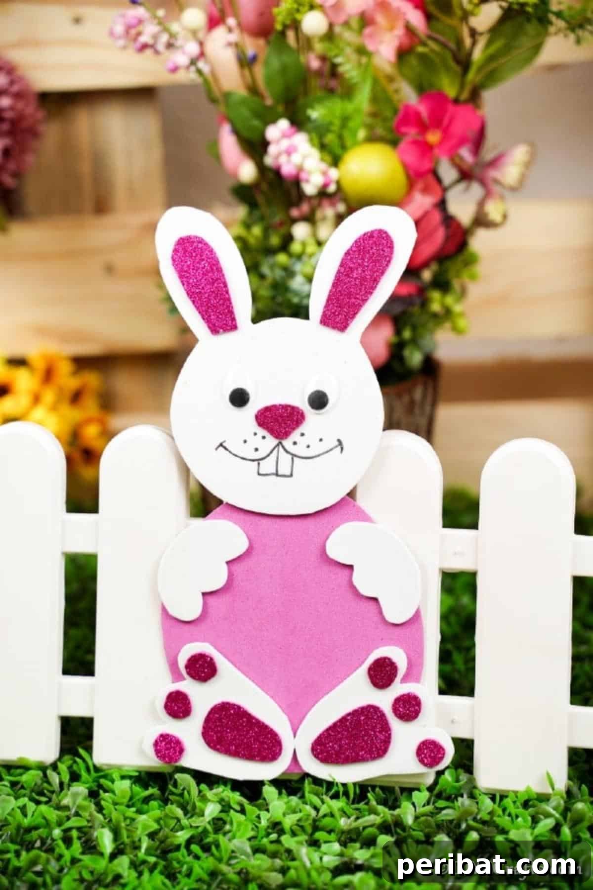 Crafting Charming Foam Easter Bunnies 6 Pink and white foam bunny standing by a miniature white picket fence
