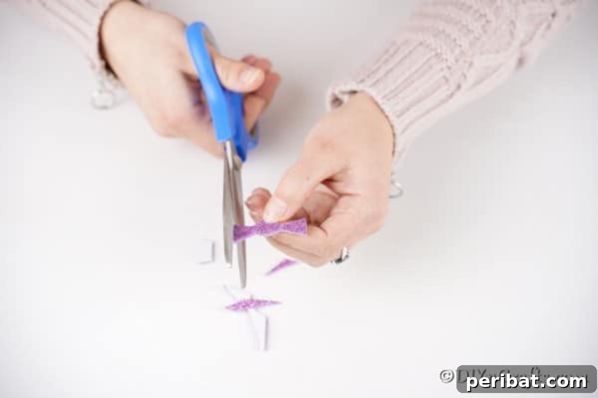 Cutting bow from glitter paper