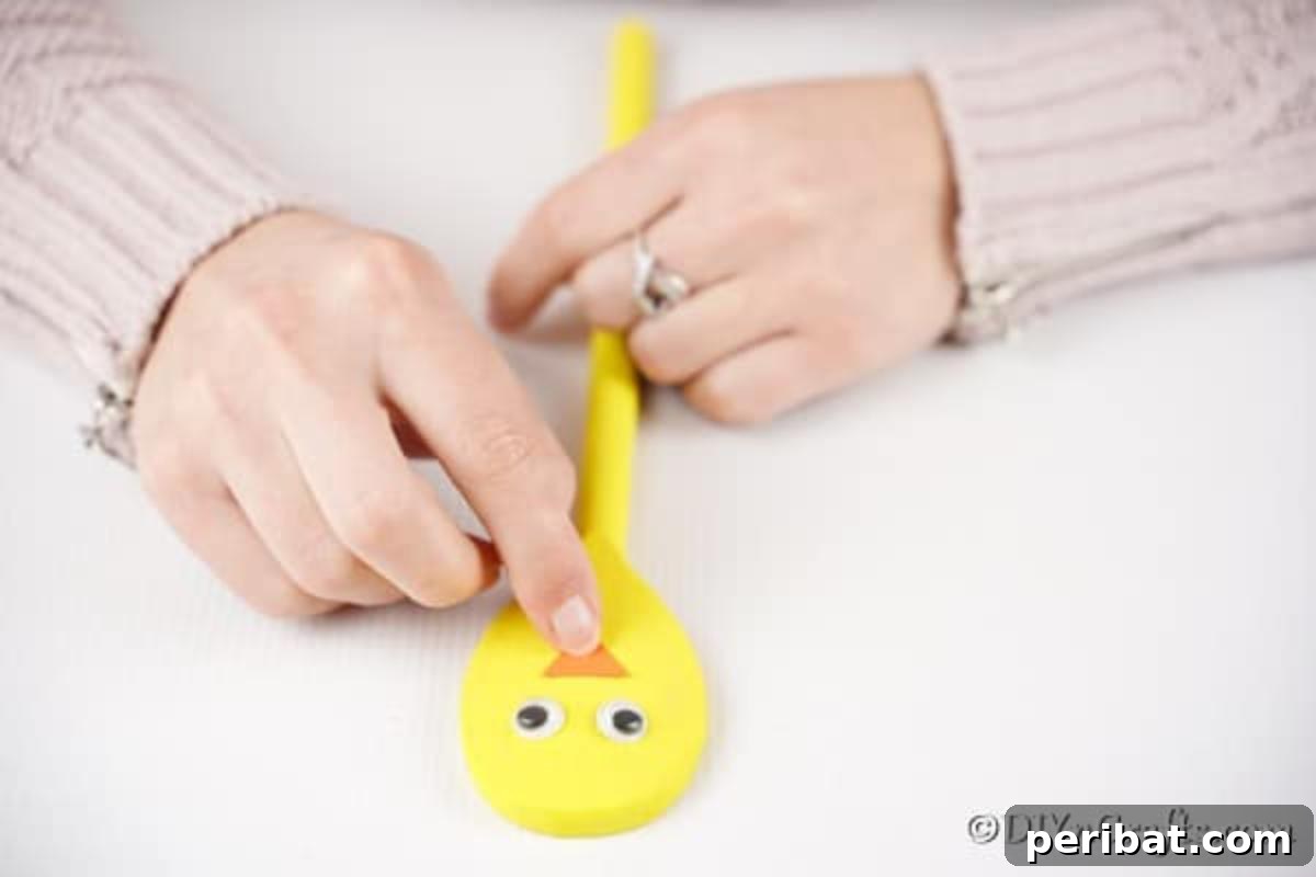 Adding orange peak to yellow spoon