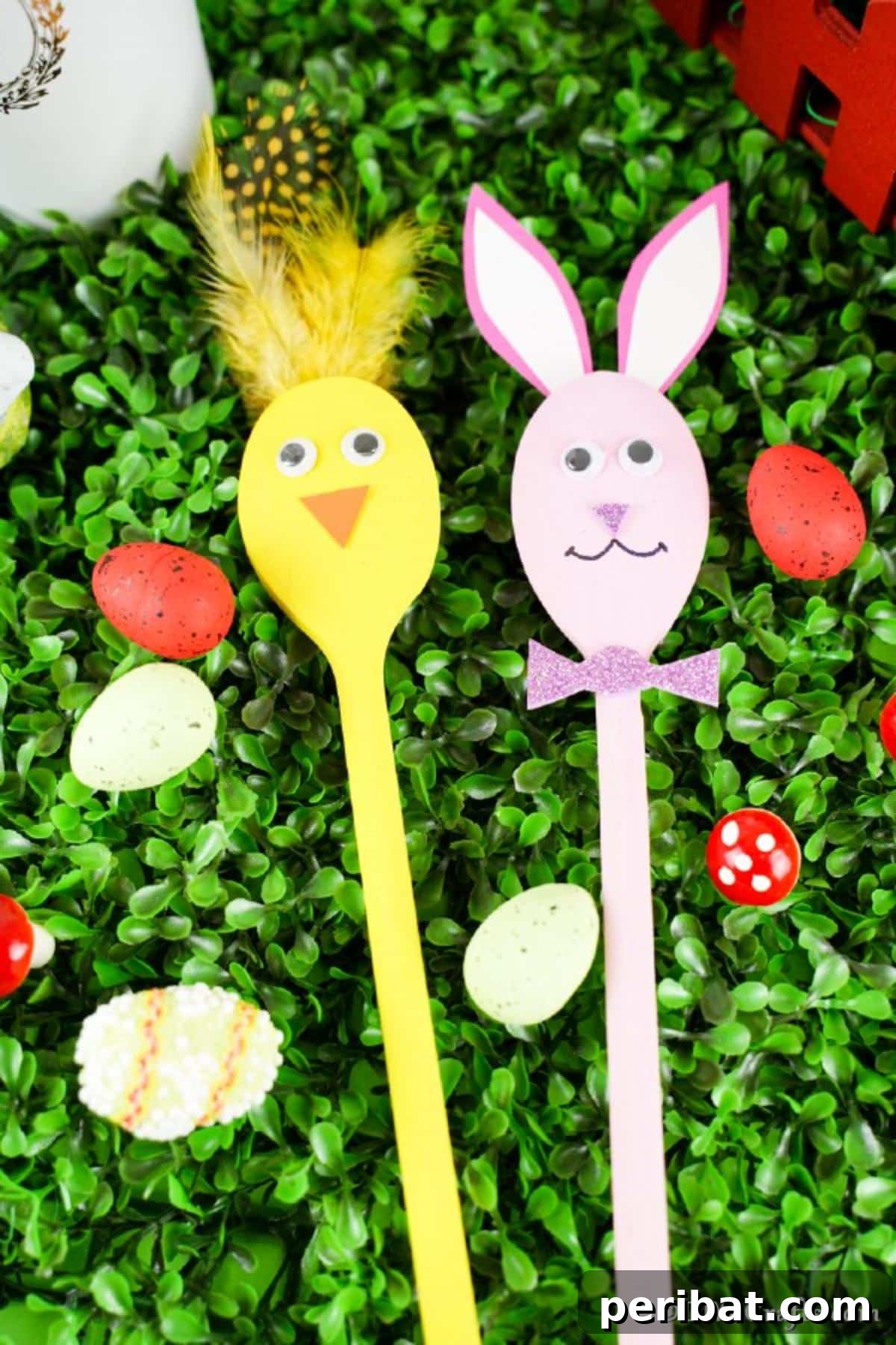 Wooden spoon bunny and chicken on grass