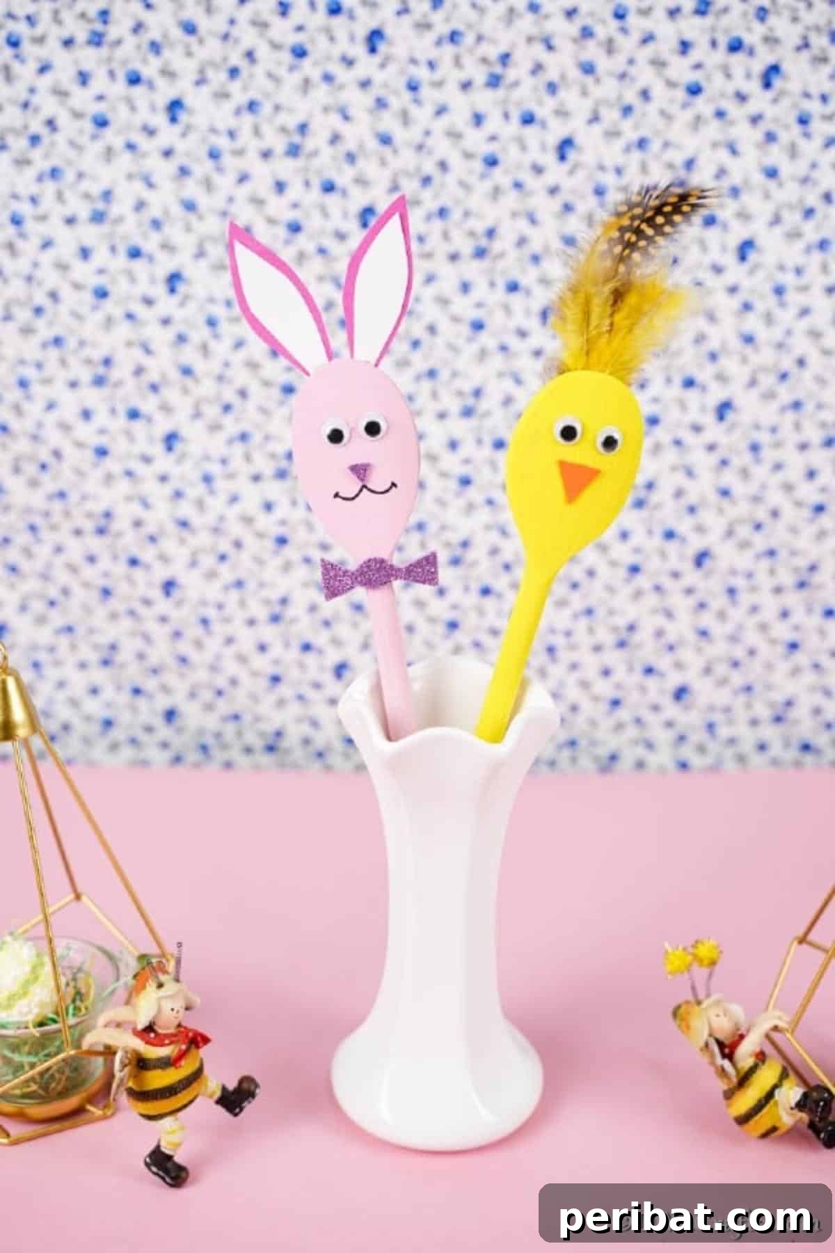 Wooden spoon and wooden bunny in vase