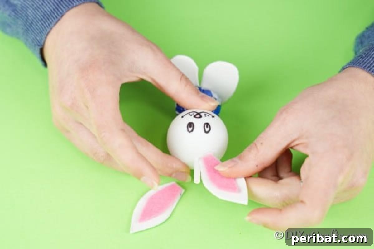 Crafting Adorable Easter Lollipop Bunnies 14 Attaching ears to lollipop bunny