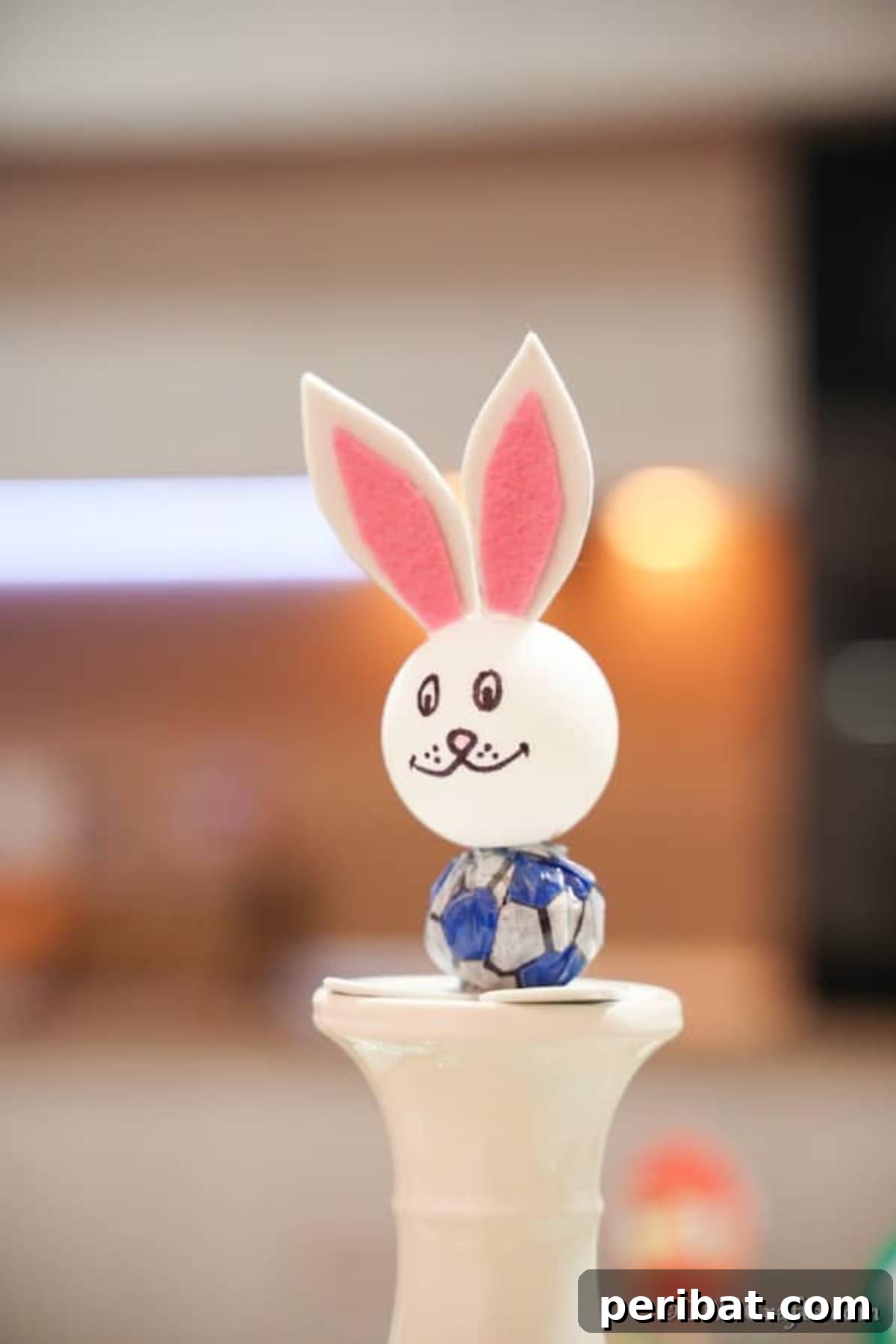 Crafting Adorable Easter Lollipop Bunnies 3 Lollipop Easter bunny sitting on top of white stand