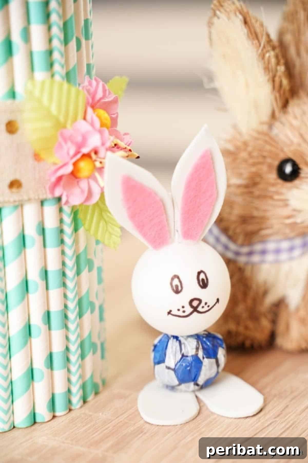 Crafting Adorable Easter Lollipop Bunnies 5 Lollipop bunny sitting by paper straw vase