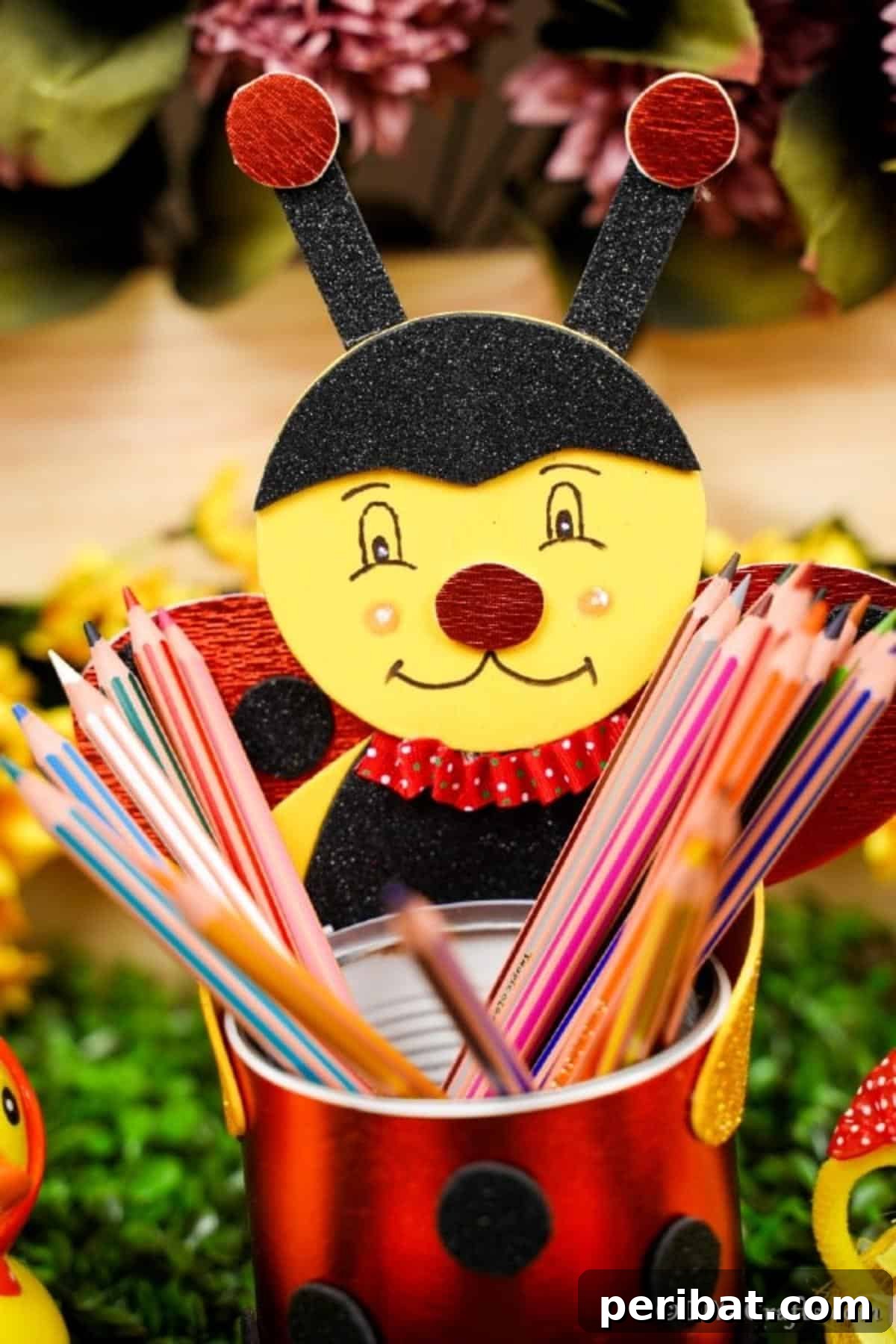 Tin can ladybug organizer filled with pencils