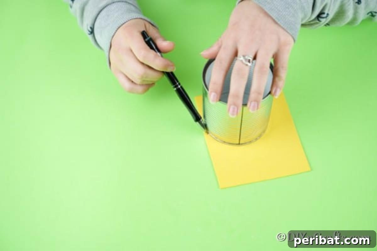 Tracing a circle onto yellow foam paper