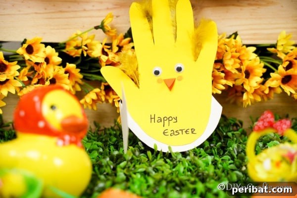 Easter chicken handprint on fake grass