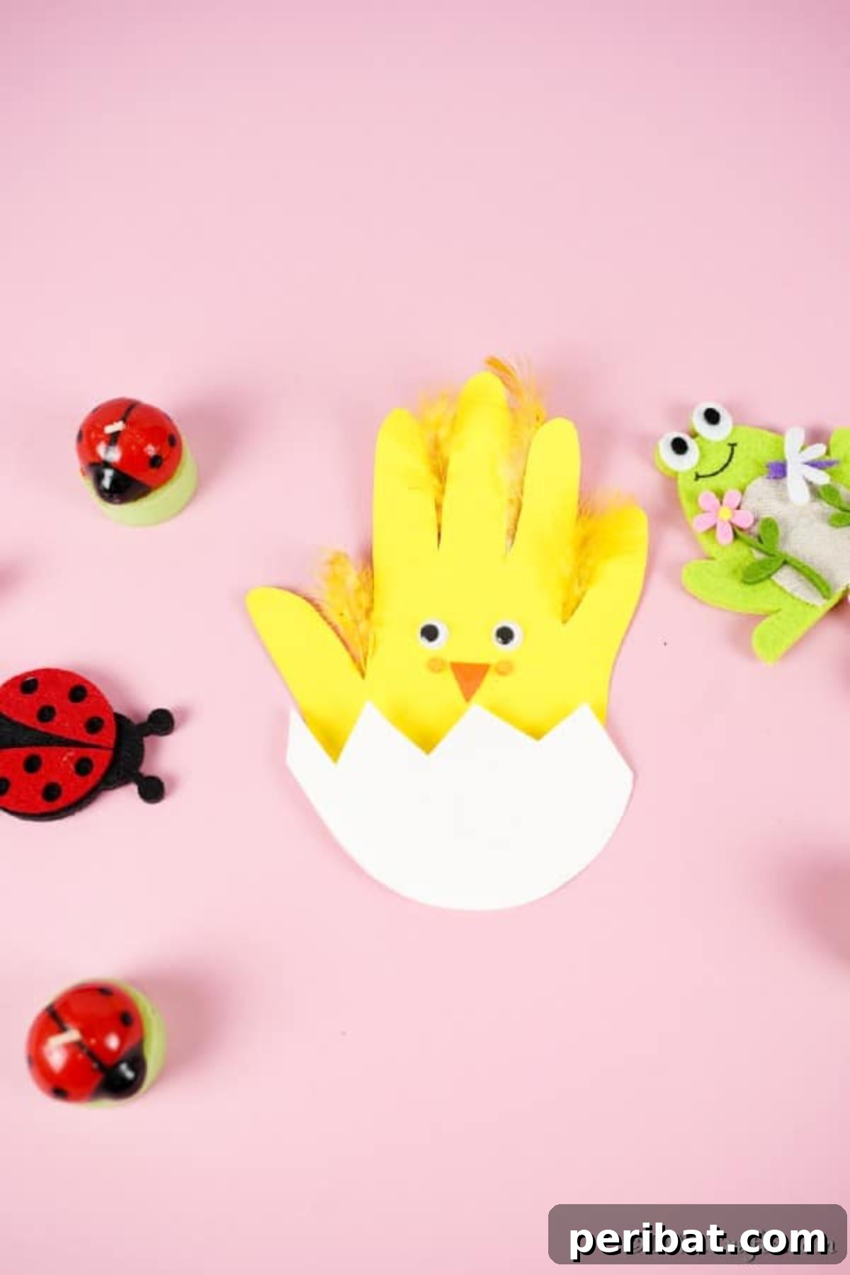 Chicken handprint card on pink paper