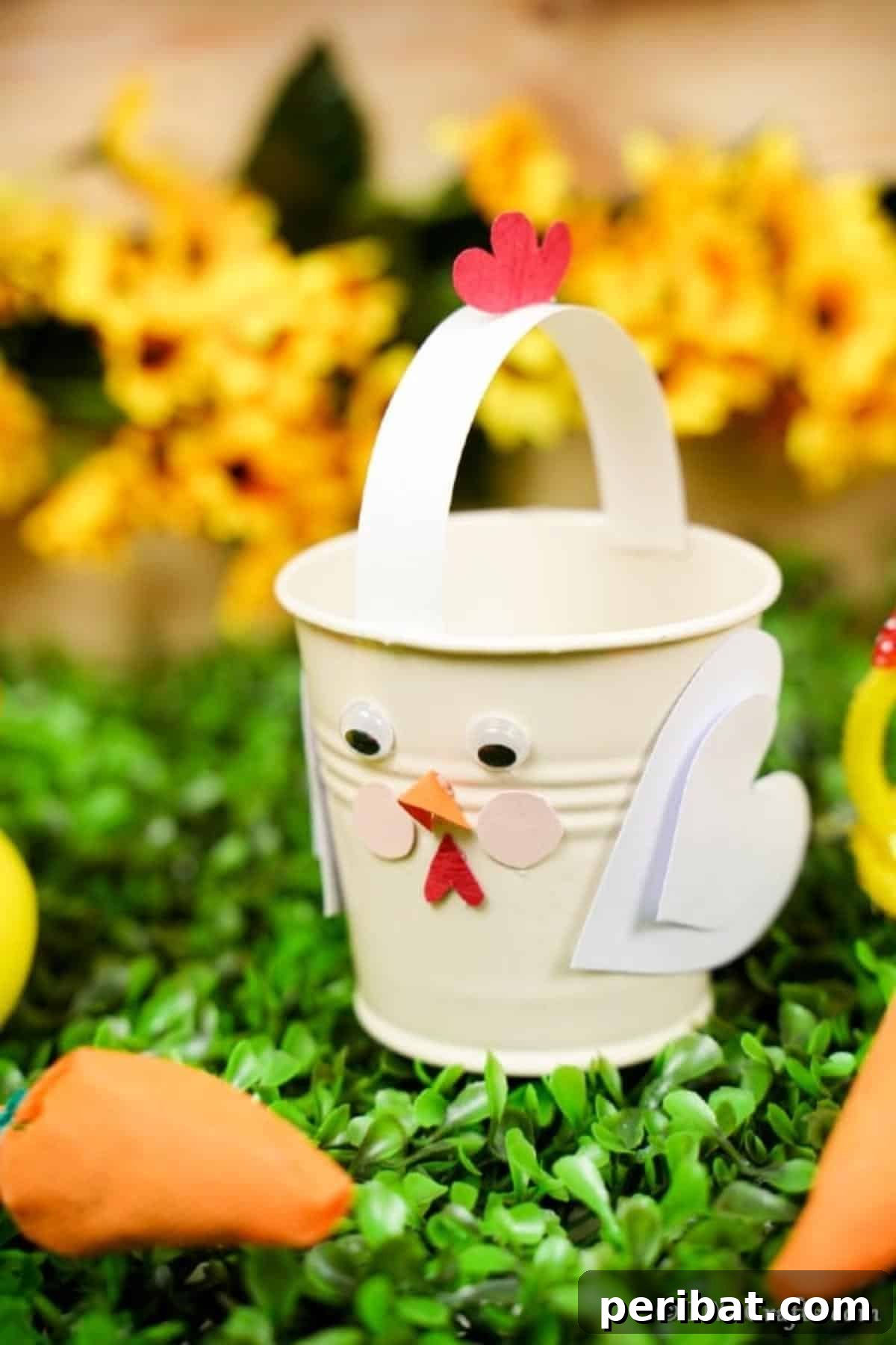 Simple Repurposed Bucket Spring Chicken 19 Completed chicken bucket craft sitting on green artificial grass, ready to be filled