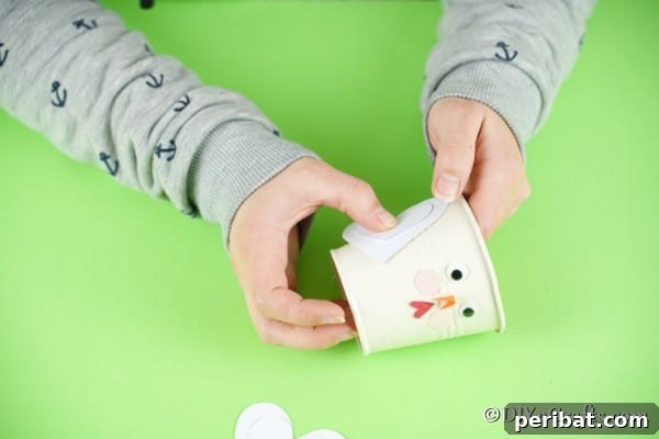 Simple Repurposed Bucket Spring Chicken 29 Gluing hearts to sides of chicken