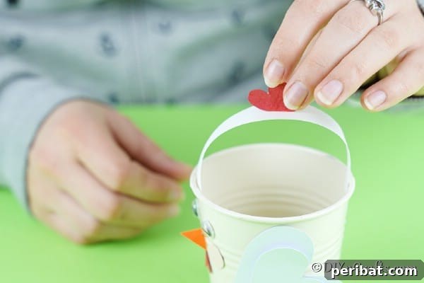 Simple Repurposed Bucket Spring Chicken 31 Gluing comb to handle on chicken bucket