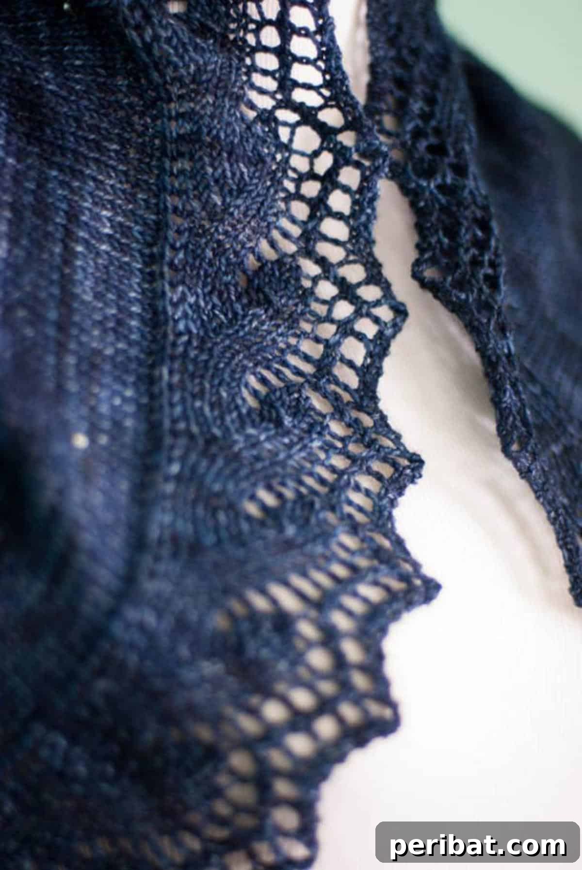 Crafting Constellations: A DIY Celestial Shawl 6 Another perspective of the beaded star map shawl, highlighting its delicate lace edging and overall artistry