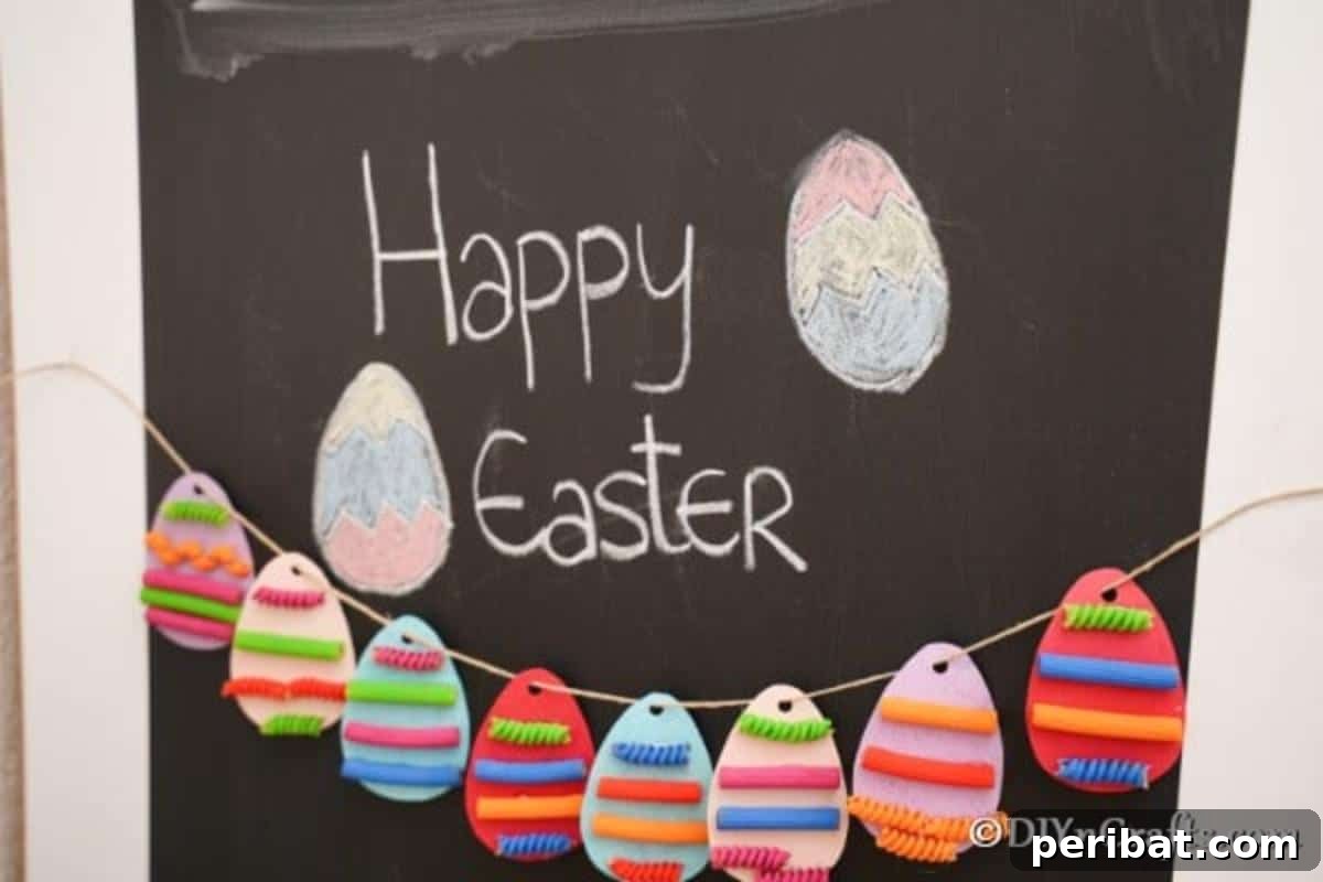 Whimsical Pasta Easter Egg Garland 18 A newly created pasta Easter egg garland hanging gracefully on a chalkboard surface