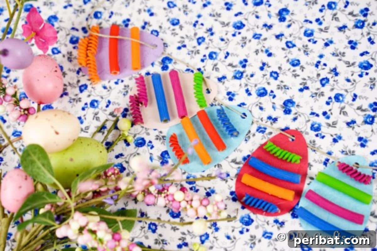 Whimsical Pasta Easter Egg Garland 3 Delightful Easter egg garland adorned with painted pasta, displayed on floral paper