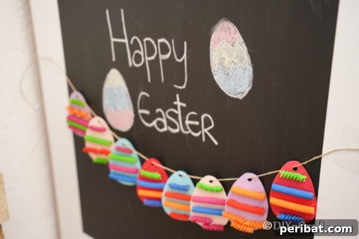 Whimsical Pasta Easter Egg Garland 6 Close-up of a whimsical pasta Easter egg garland hanging on a dark chalkboard