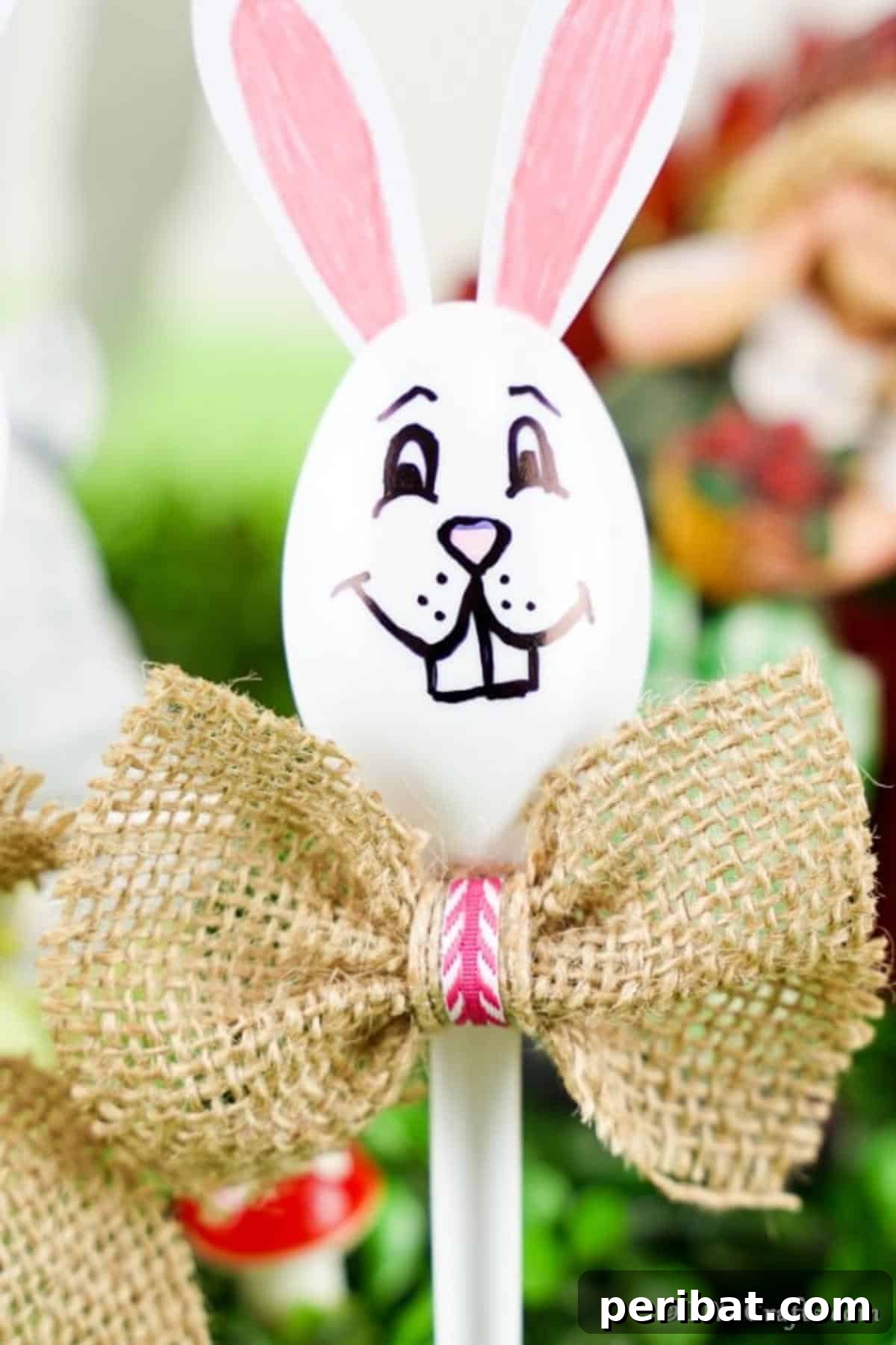 Adorable Upcycled Spoon Bunnies for Easter 4 White plastic spoon bunny adorned with a burlap bow