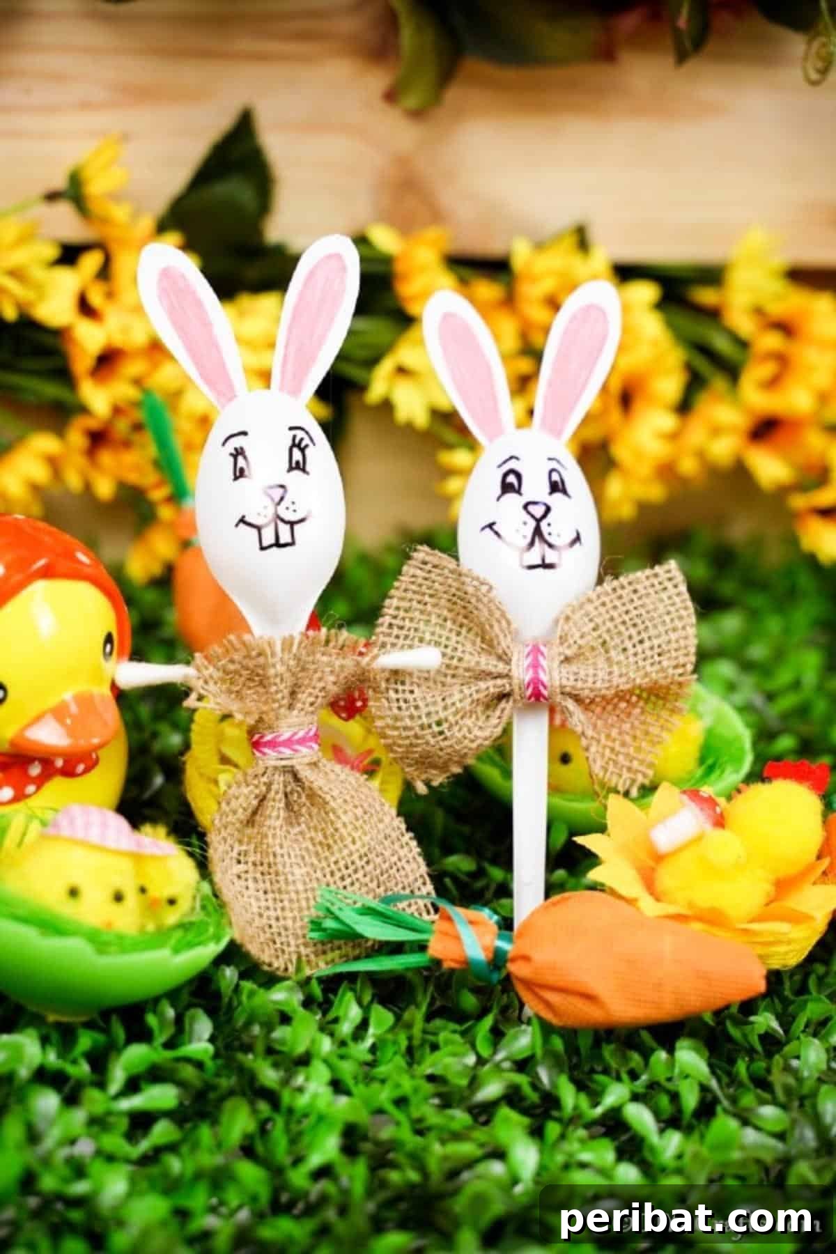 Adorable Upcycled Spoon Bunnies for Easter 5 Easter bunny spoons nestled in grass with other Easter decor
