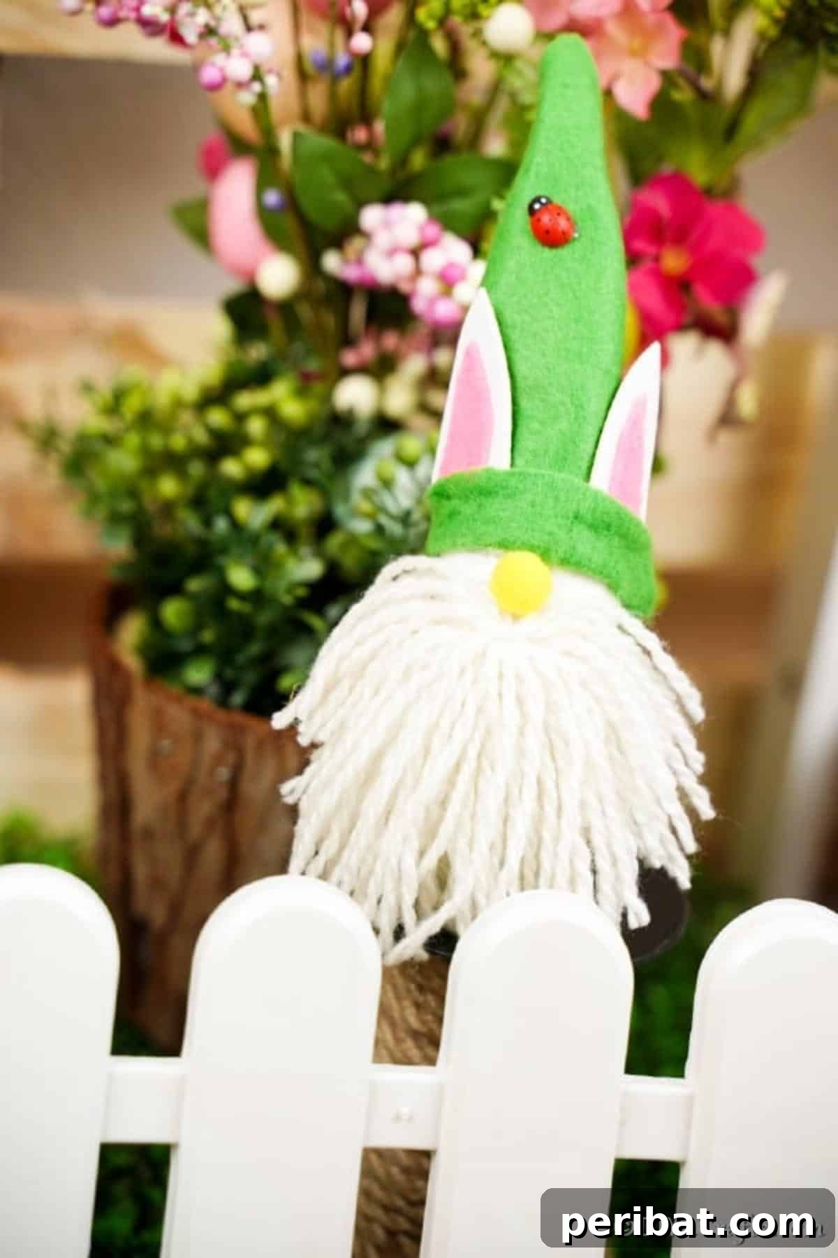 Whimsical Nordic Easter Gnome Creation 3 A handcrafted Easter gnome with a green hat and white beard, sitting serenely by a white picket fence, symbolizing spring's arrival.