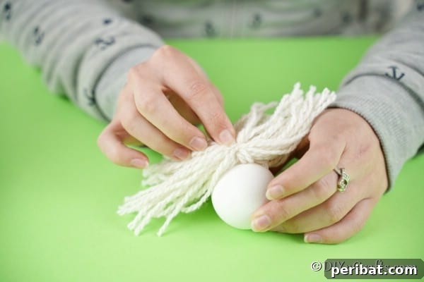 Whimsical Nordic Easter Gnome Creation 23 Attaching yarn beard to egg