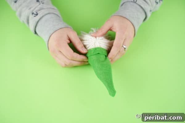 Whimsical Nordic Easter Gnome Creation 26 Attaching hat to top of egg