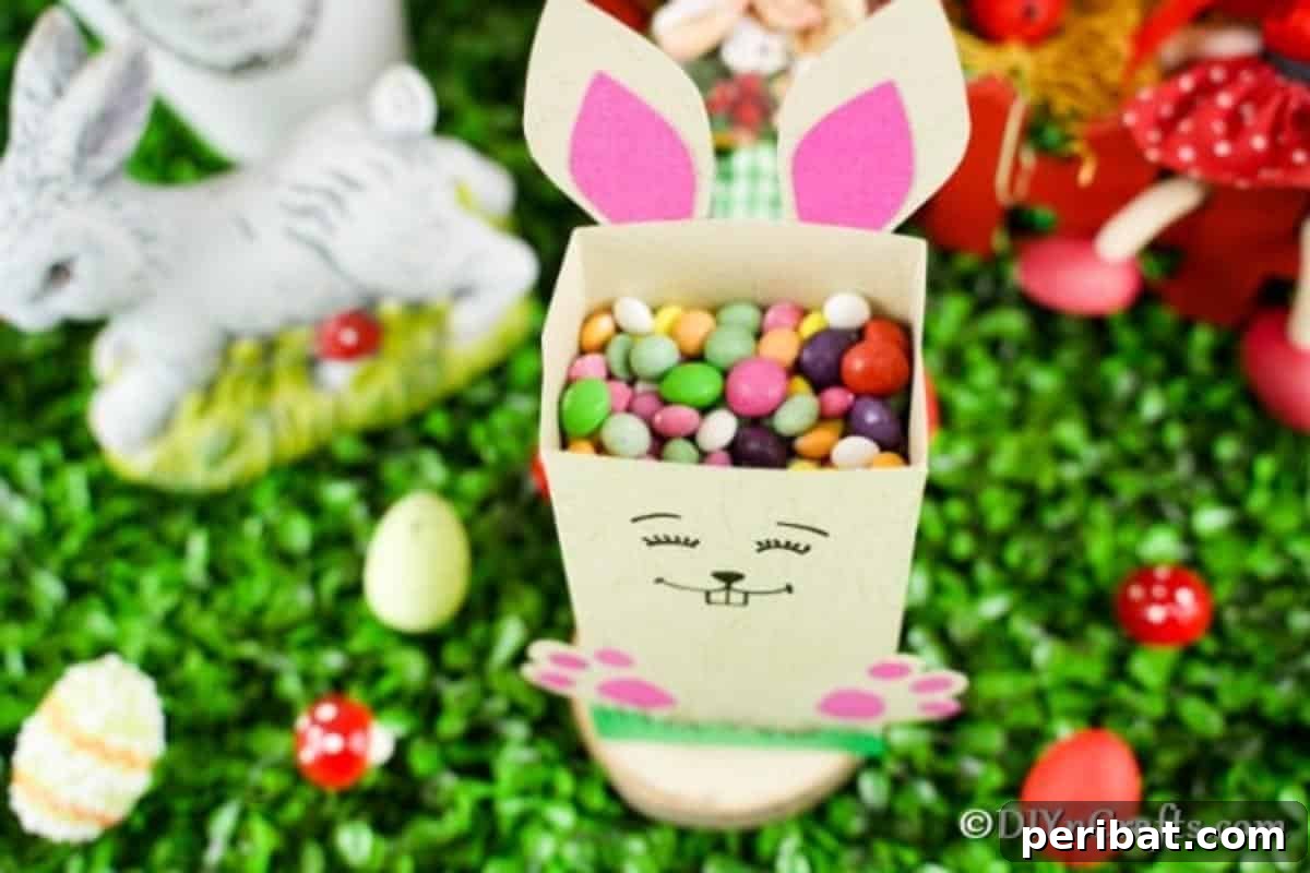 DIY Easter Treat Pouch Video Guide 3 Easter candy holder filled with colorful candy sitting on green grass, ready for an Easter celebration