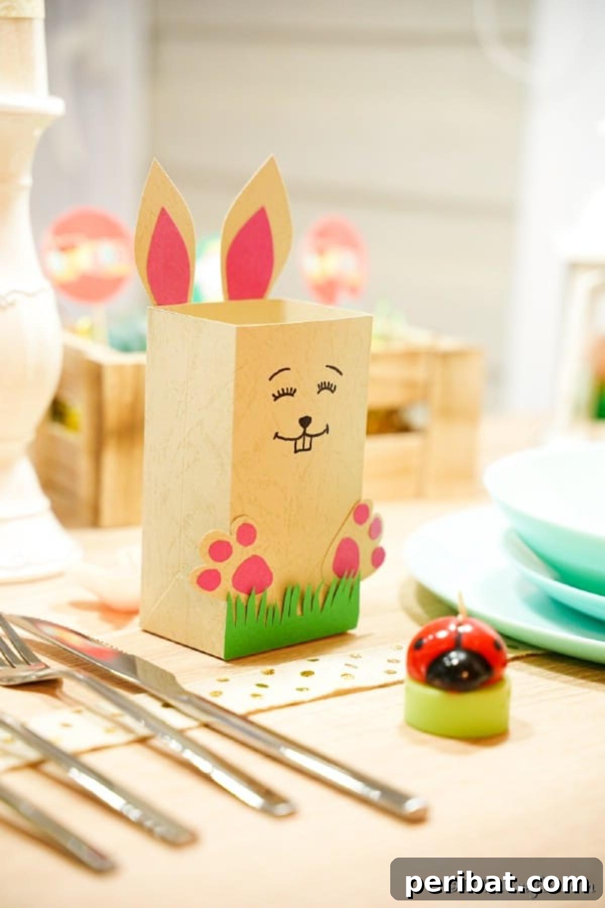 DIY Easter Treat Pouch Video Guide 4 Paper candy holder bag on an Easter table adorned with colorful decorations and other festive items