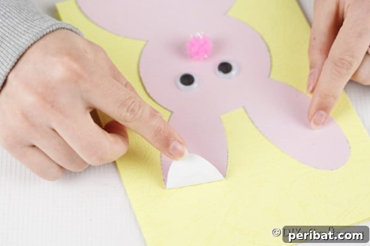 DIY Easter Bunny Card Free Printable Video 13 Folding ear of bunny