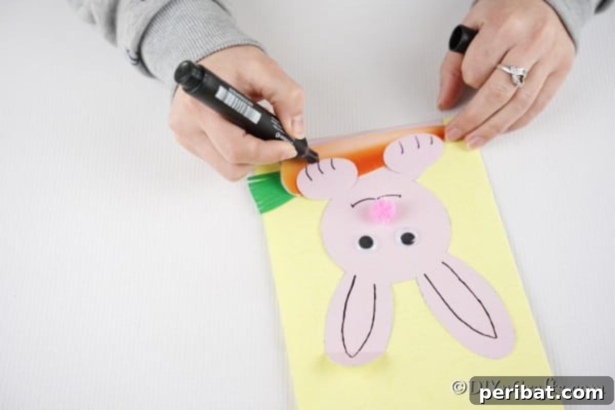DIY Easter Bunny Card Free Printable Video 15 Gluing cunny paws to carrot