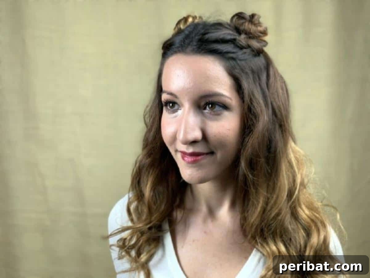 Chic Braided Twin Bun Half Updo 6 Smiling woman with completed braided wavy top knots hairstyle