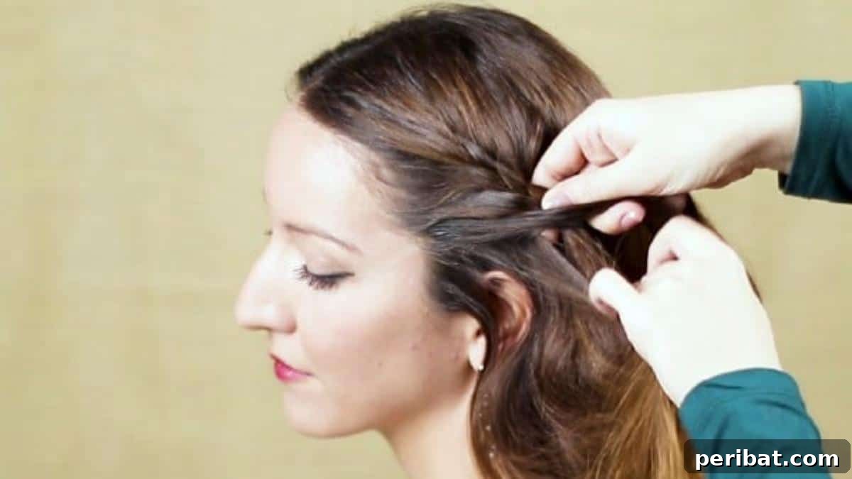 Elegant Side Braid Ponytail Tutorial for a Polished Look 7 Adding more hair into braid