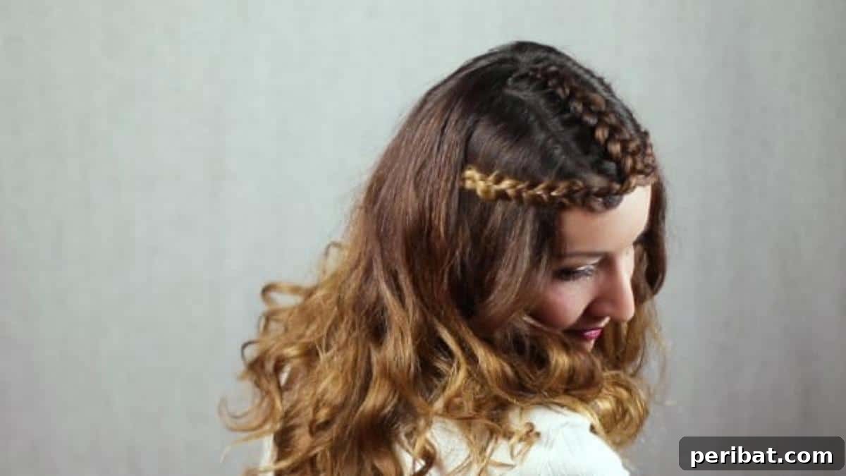 Regal Braided Crown Updo Video Steps 14 Step 5: Overhead view of the princess crown hairstyle, showing the secured braids.