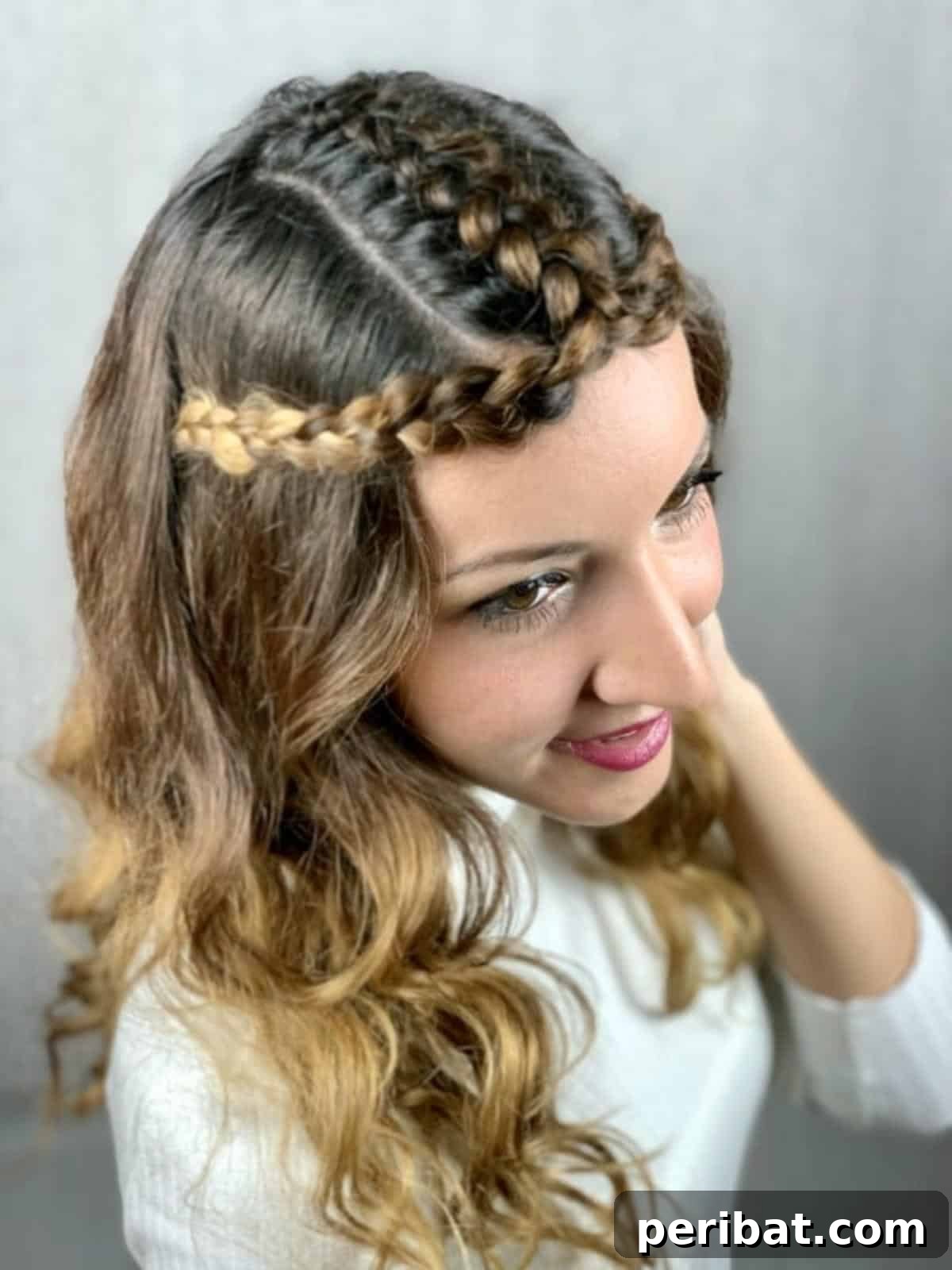 Regal Braided Crown Updo Video Steps 3 Close-up view of the intricate Princess Crown Braid, highlighting its detailed texture.