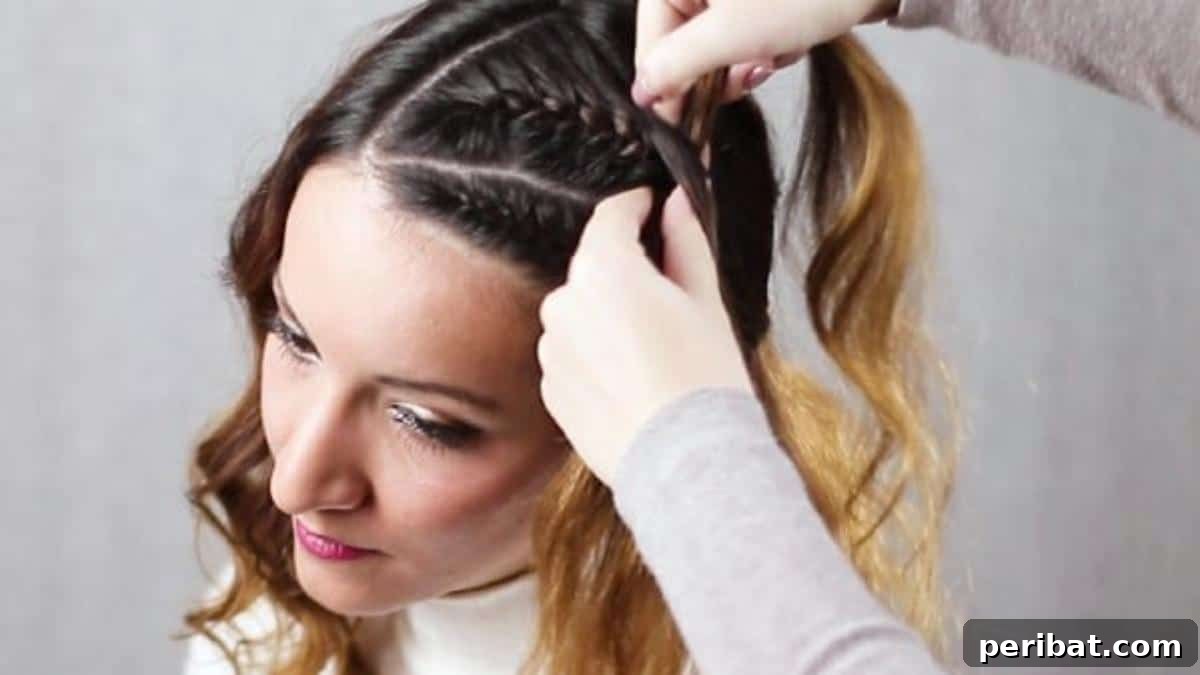 Quick Side Braided Half Up Tutorial 13 Initiating the French braid on the upper section, close to the scalp
