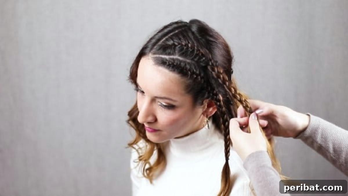 Quick Side Braided Half Up Tutorial 14 Finishing the second braid by plaiting down the side of the head