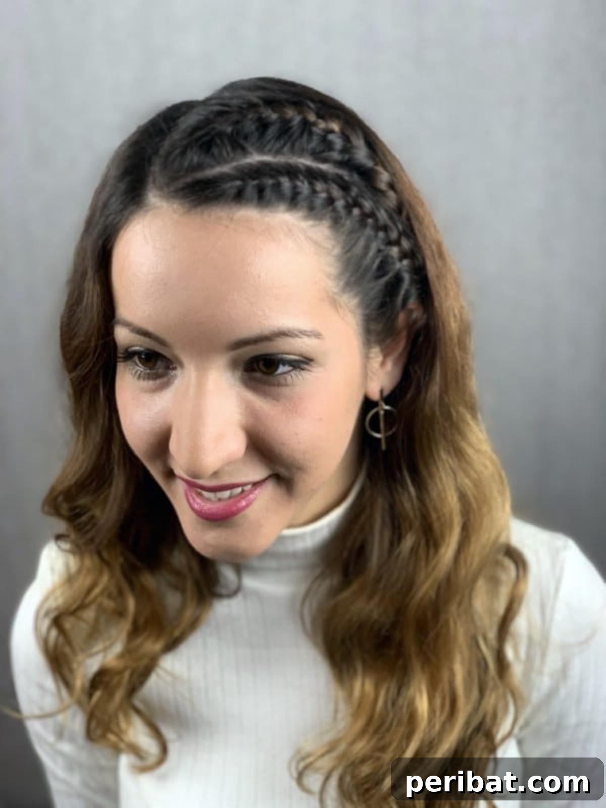 Quick Side Braided Half Up Tutorial 5 Frontal view of a woman with an elegant side braid hairstyle