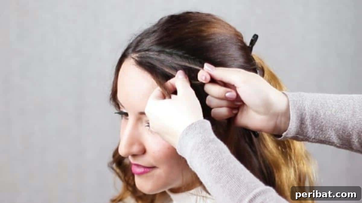Quick Side Braided Half Up Tutorial 8 Starting the French braid on the lower front section of hair
