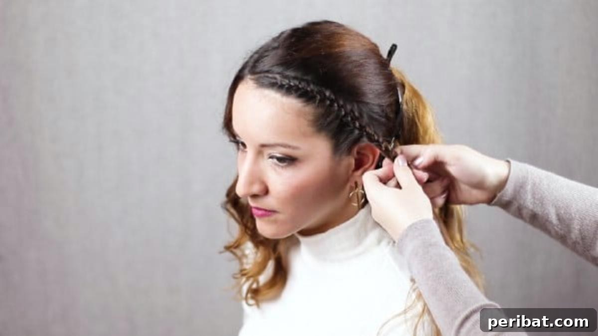 Quick Side Braided Half Up Tutorial 10 Continuing the braid down the side of the head with a simple plait