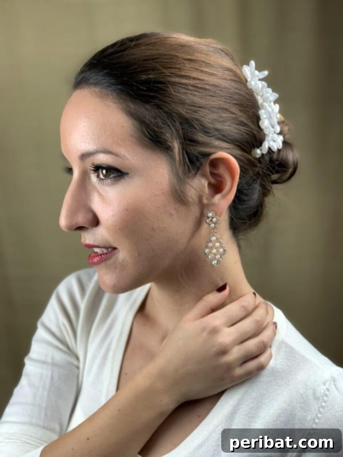 Quick and Chic Braided Messy Bun Video 3 Beautiful woman confidently showcasing a chic braided messy bun