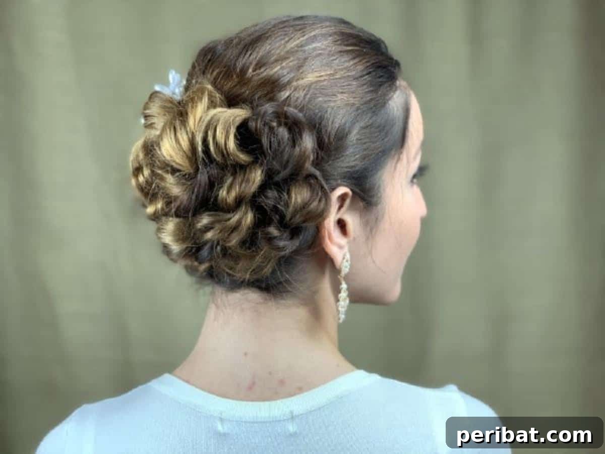 Quick and Chic Braided Messy Bun Video 4 Close-up of a brunette with a stylish, textured braided bun