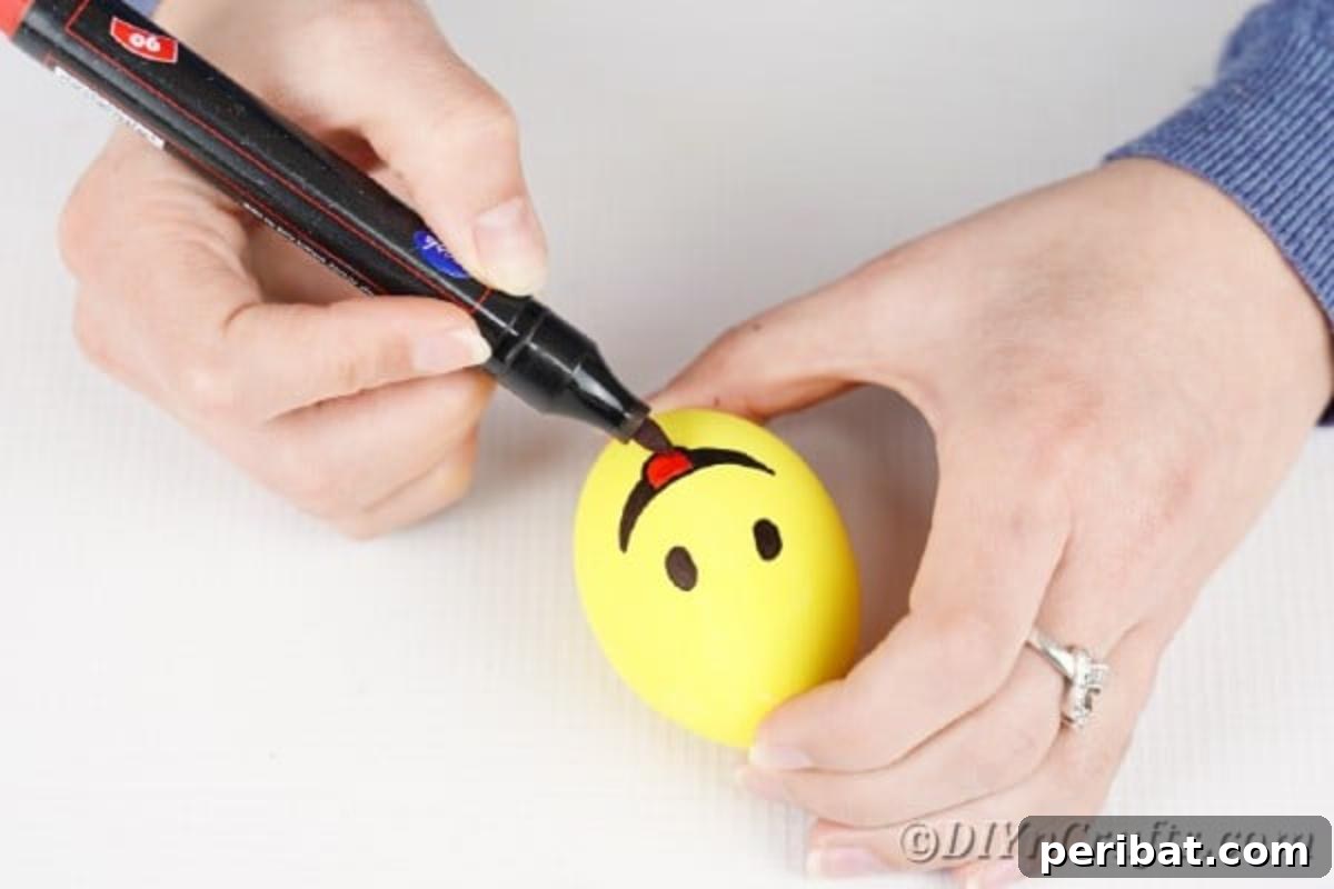 Crafting Cheerful Emoji Easter Eggs 11 Adding tongue to Emoji egg