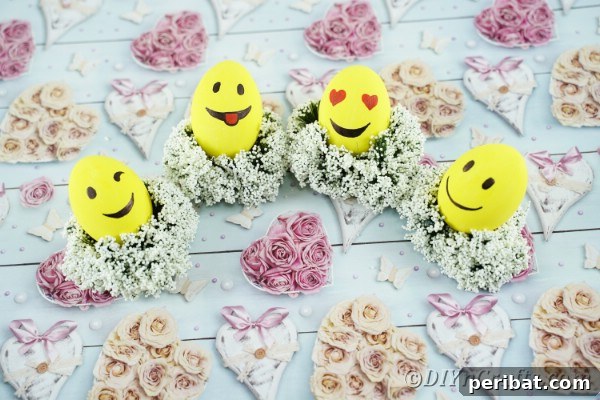 Emoji eggs on flowers