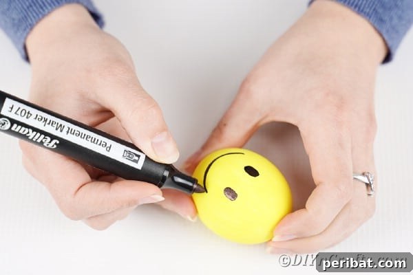 Crafting Cheerful Emoji Easter Eggs 15 Drawing smile on easter egg