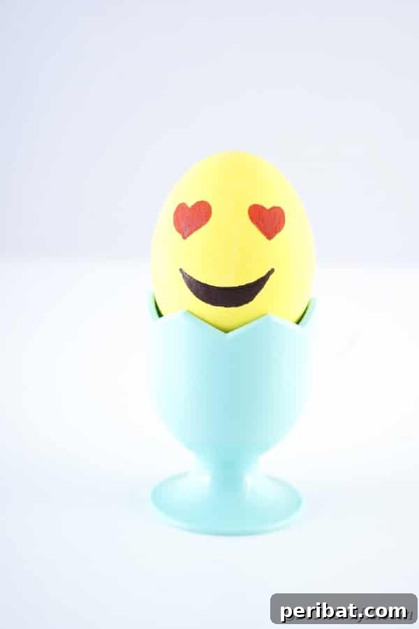Crafting Cheerful Emoji Easter Eggs 16 A heart eyed emoji egg in egg cup