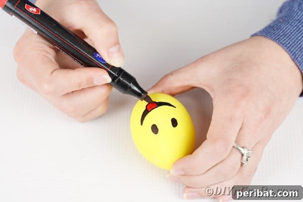 Crafting Cheerful Emoji Easter Eggs 17 Adding tongue to Emoji egg