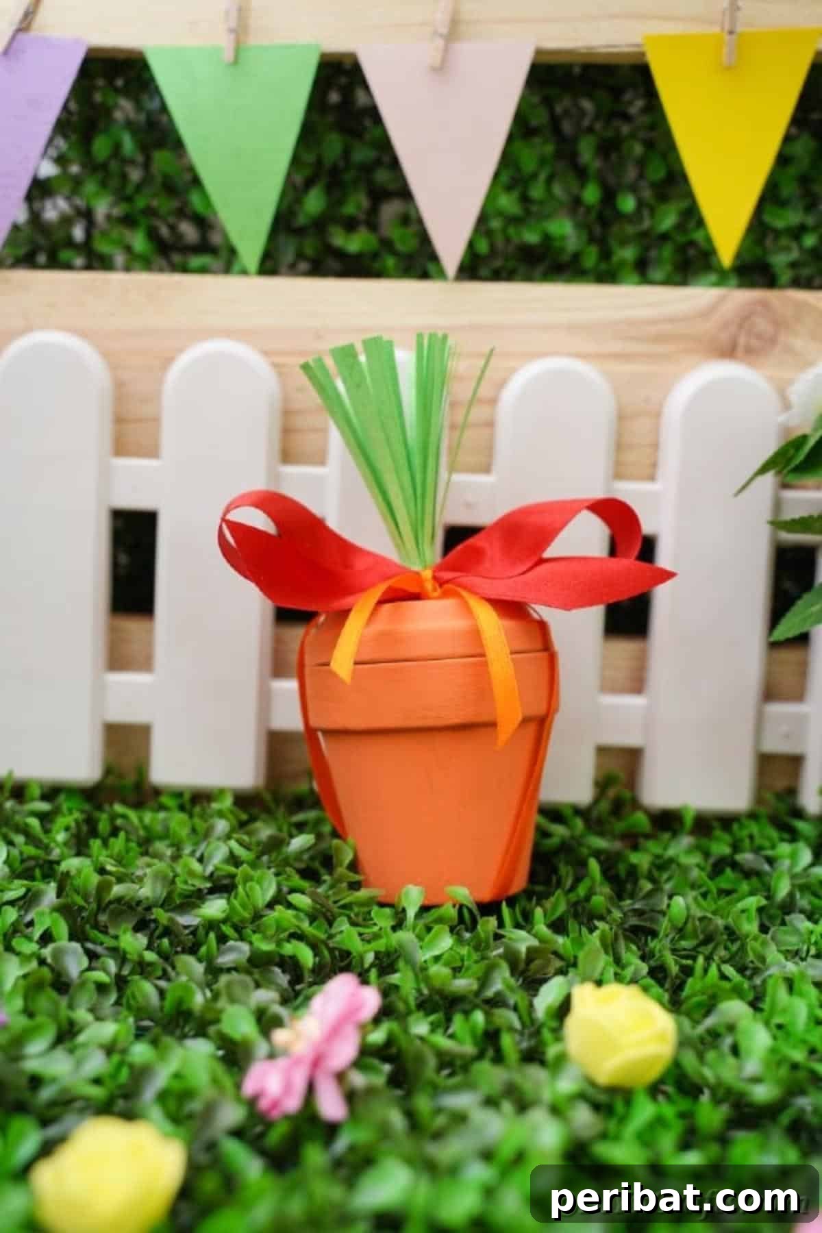 Handcrafted Easter Carrot Pots 15 Flower pot carrot in front of white fence