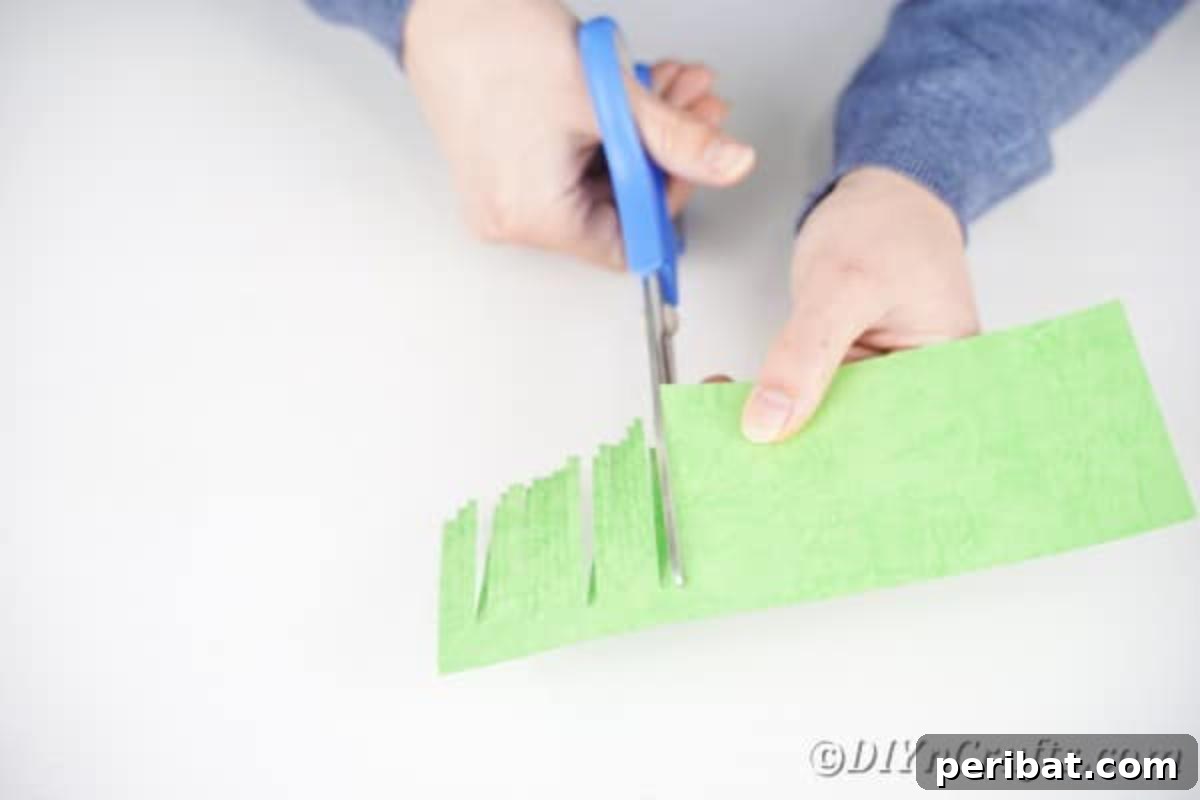 Handcrafted Easter Carrot Pots 9 Cutting slices in green paper