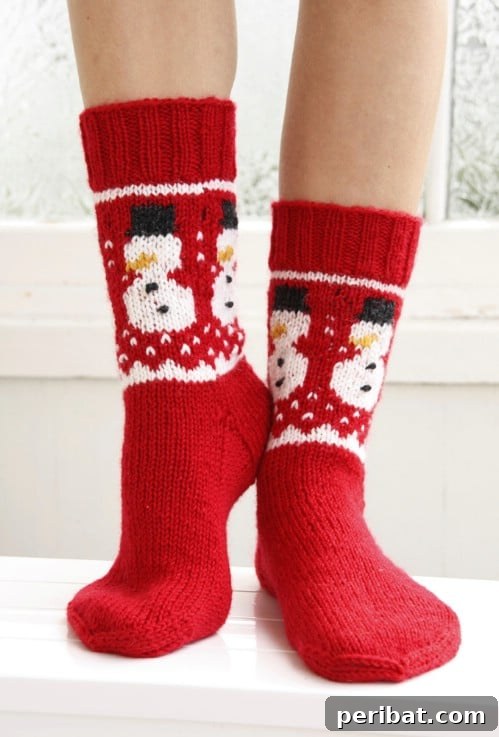 Graceful Knitted Socks with Flower and Leaf Motifs