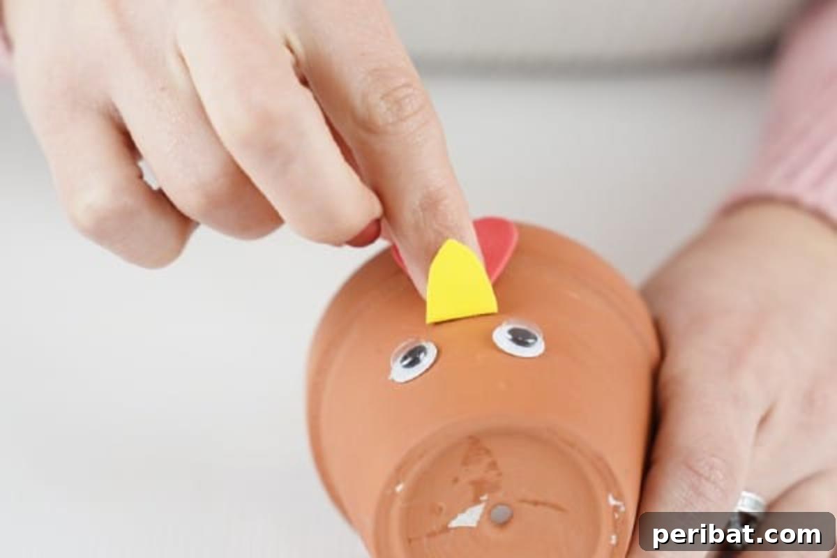 Craft Your Own Cute Flower Pot Chicken 12 Gluing yellow comb in place